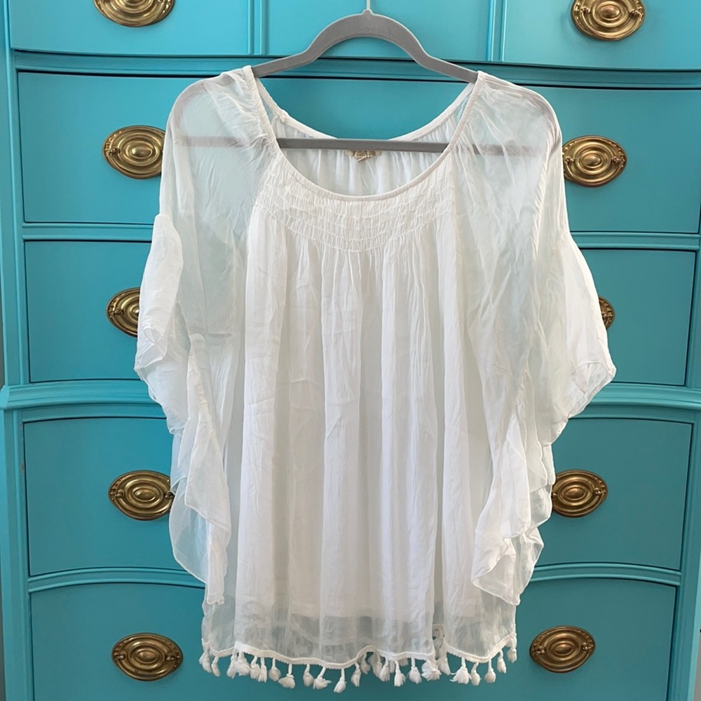 Creamy white flows blouse
